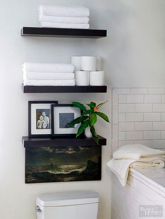 Towel shelf above clearance toilet