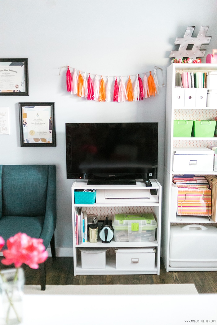 Office Makeover - Amber Oliver. Bright and cheerful office space with floral fabric wall. Photo by thinkelysian.com