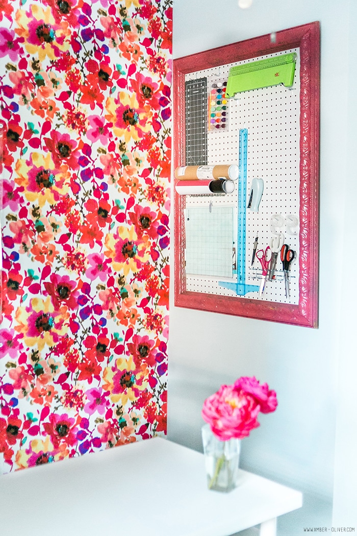 Office Makeover - Amber Oliver. Bright and cheerful office space with floral fabric covered wall. Photo by thinkelysian.com