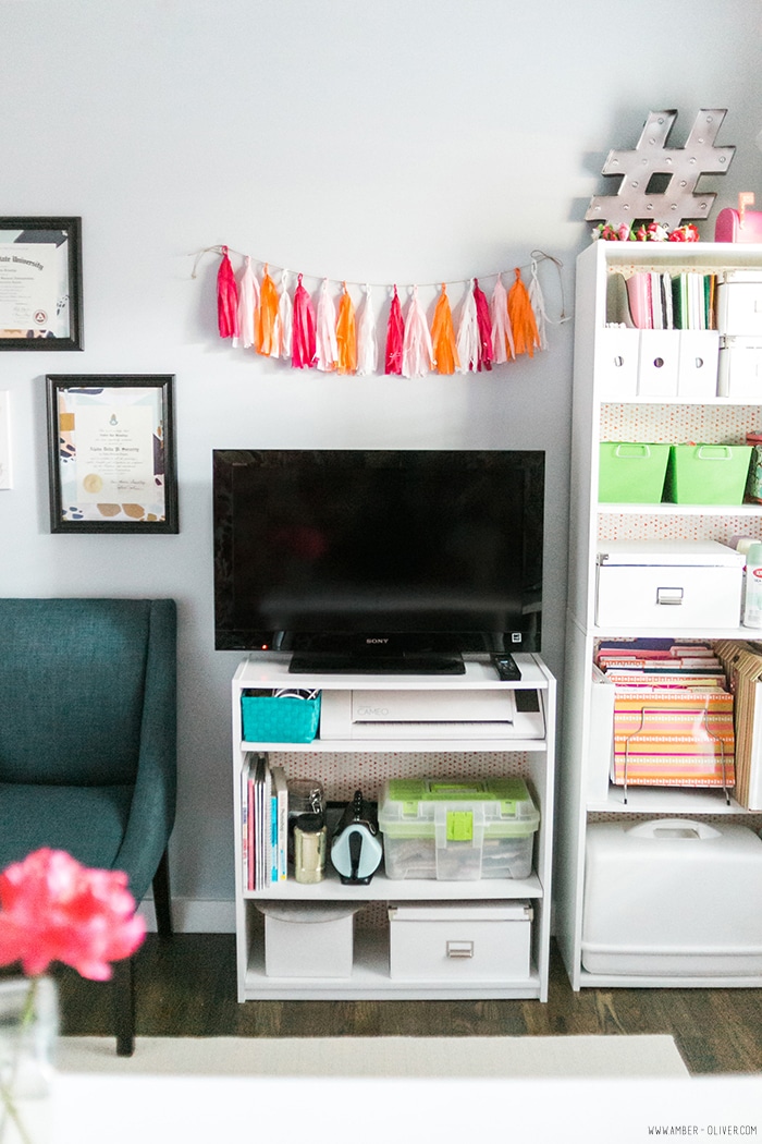 Office Makeover - Amber Oliver. Bright and cheerful office space with floral fabric wall. Photo by thinkelysian.com