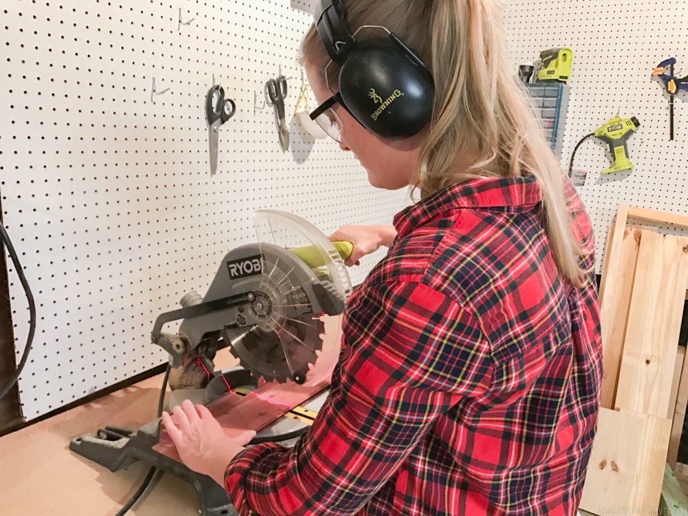 cutting cedar for lining a closet with cedar