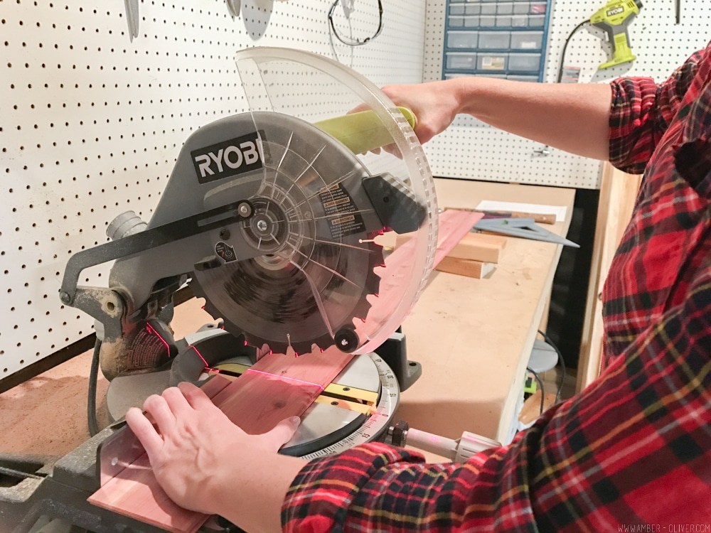 cutting cedar for lining a closet with cedar