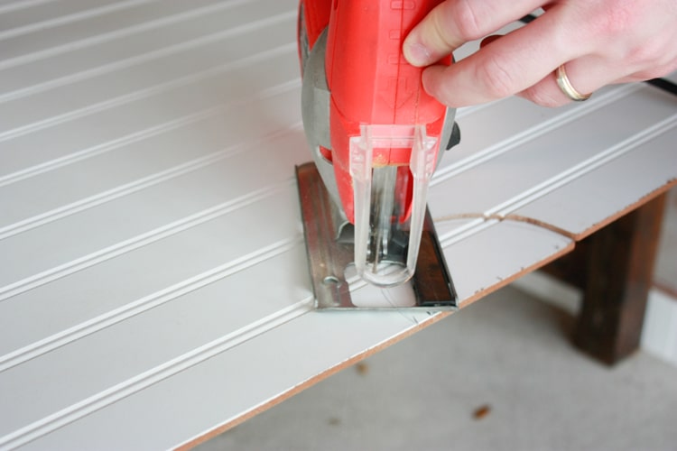 you don't have to remove popcorn ceiling - cover popcorn ceiling with bead board!