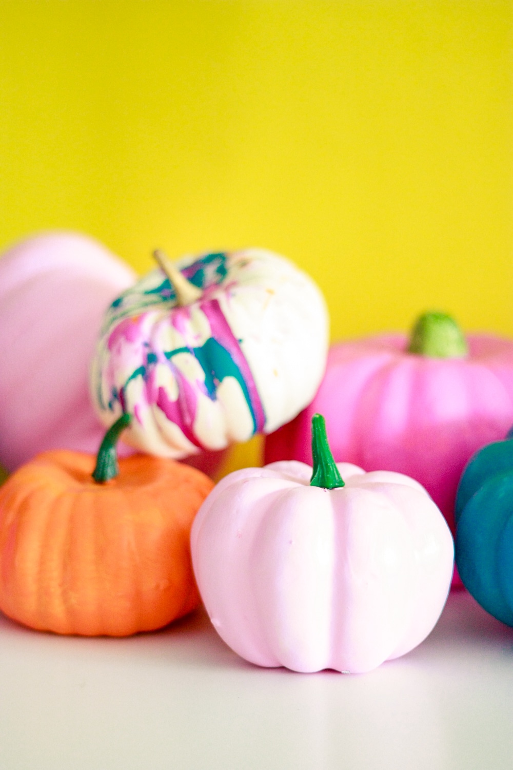 Bright color painted pumpkins and free punny halloween printables!