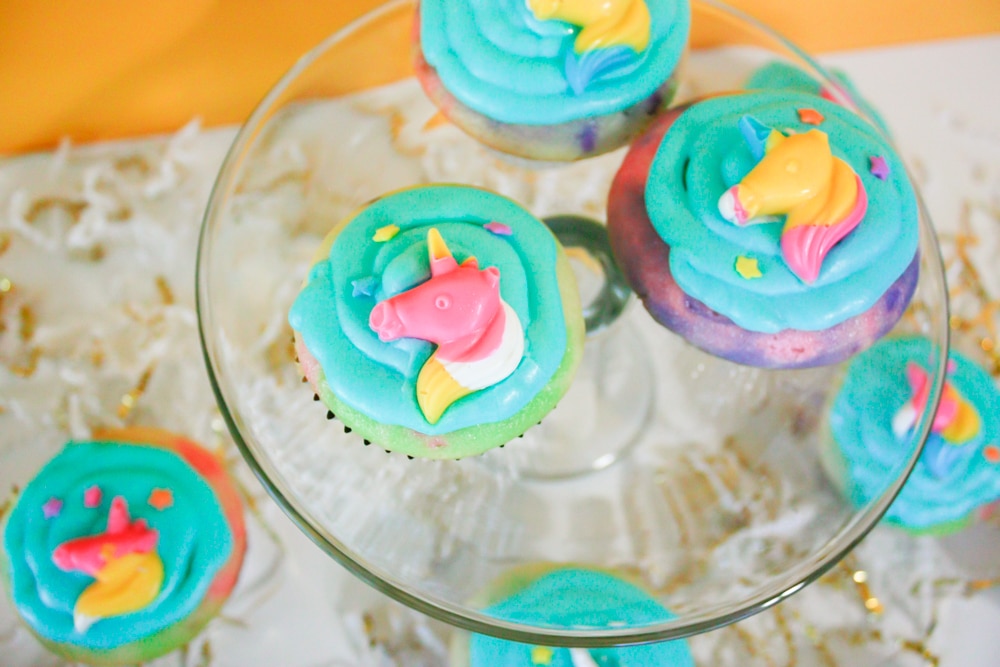 Close up of Unicorn cupcakes with unicorn candy and easy homemade icing!