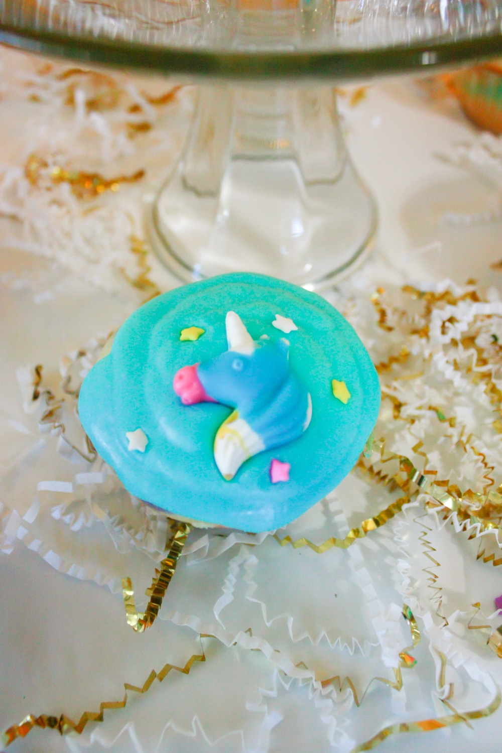 Close up of Unicorn cupcakes with unicorn candy and easy homemade icing!