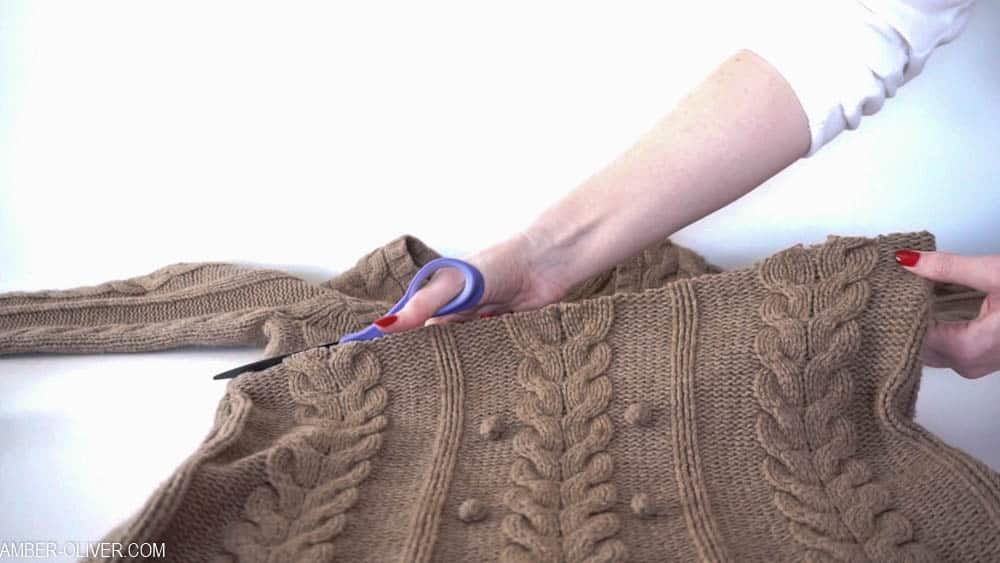 cutting an upcycled sweater to create a diy lampshade