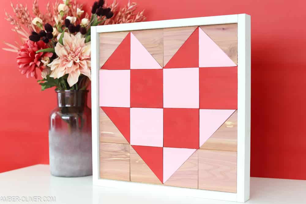 How To Make A Barn Quilt with cedar planks - barn quilts with red and pink heart and a red background