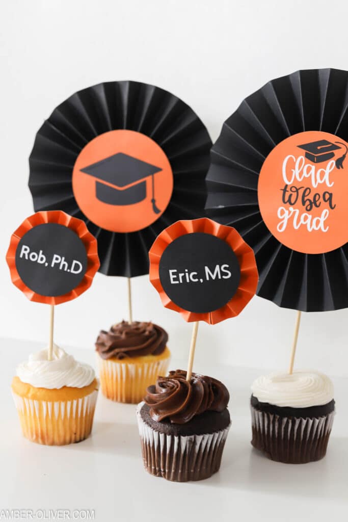 graduation DIY cupcake toppers made with paper rosettes from the Cricut Maker