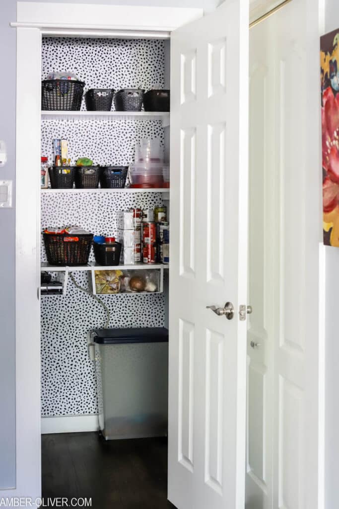 organized pantry decorated with peel and stick wallpaper from Target