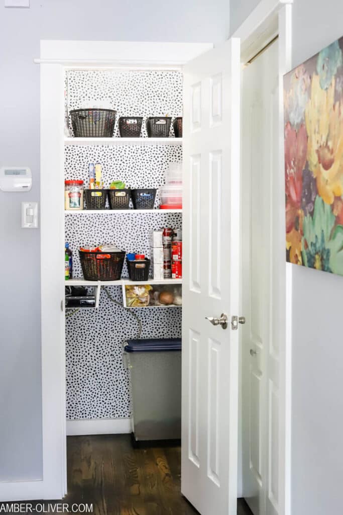 organized pantry decorated with peel and stick wallpaper from Target