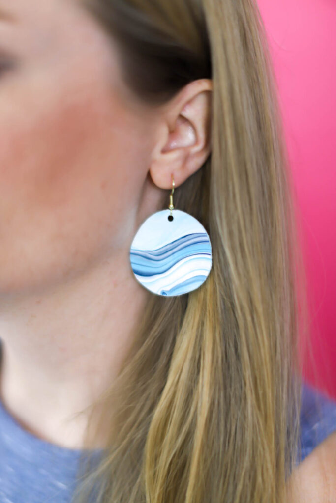 close up of DIY earrings made from an acrylic pour painting