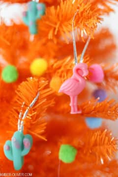 Resin Flamingo Ornament on an orange christmas tree