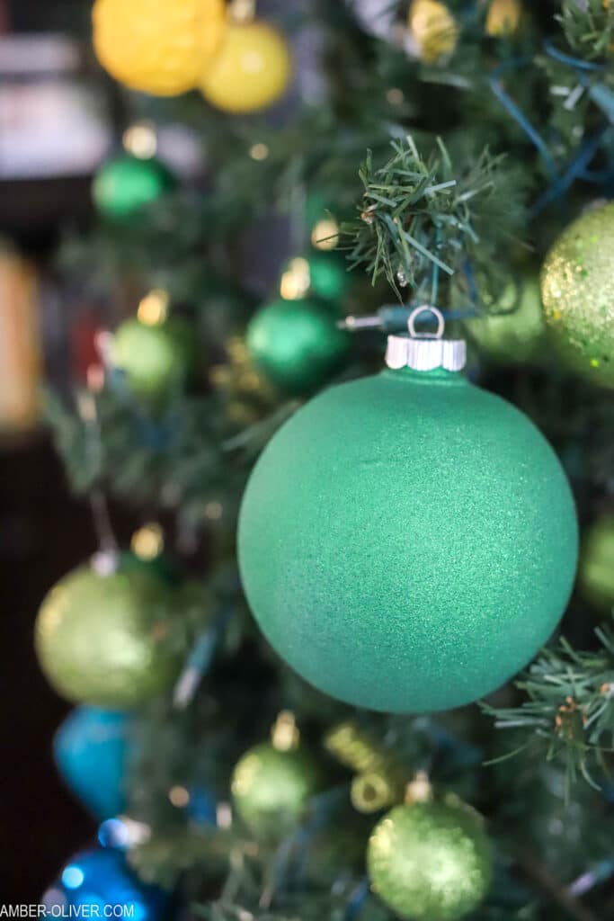 green ball spray painted for rainbow christmas tree