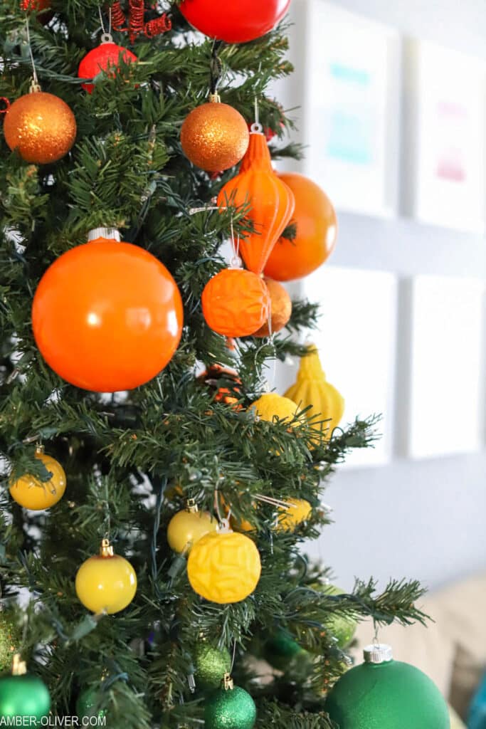 rainbow christmas tree ornaments in a bright room