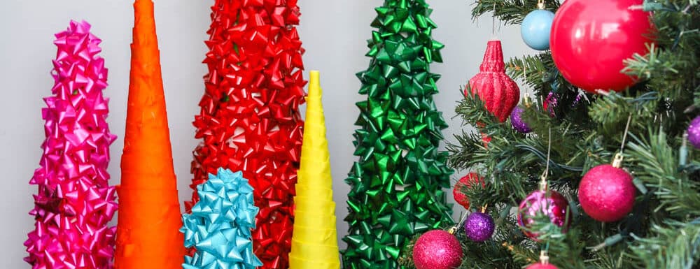 cone christmas trees made with colorful ribbons and bows