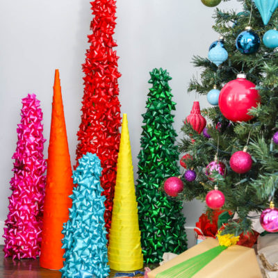 cone christmas trees made with colorful ribbons and bows