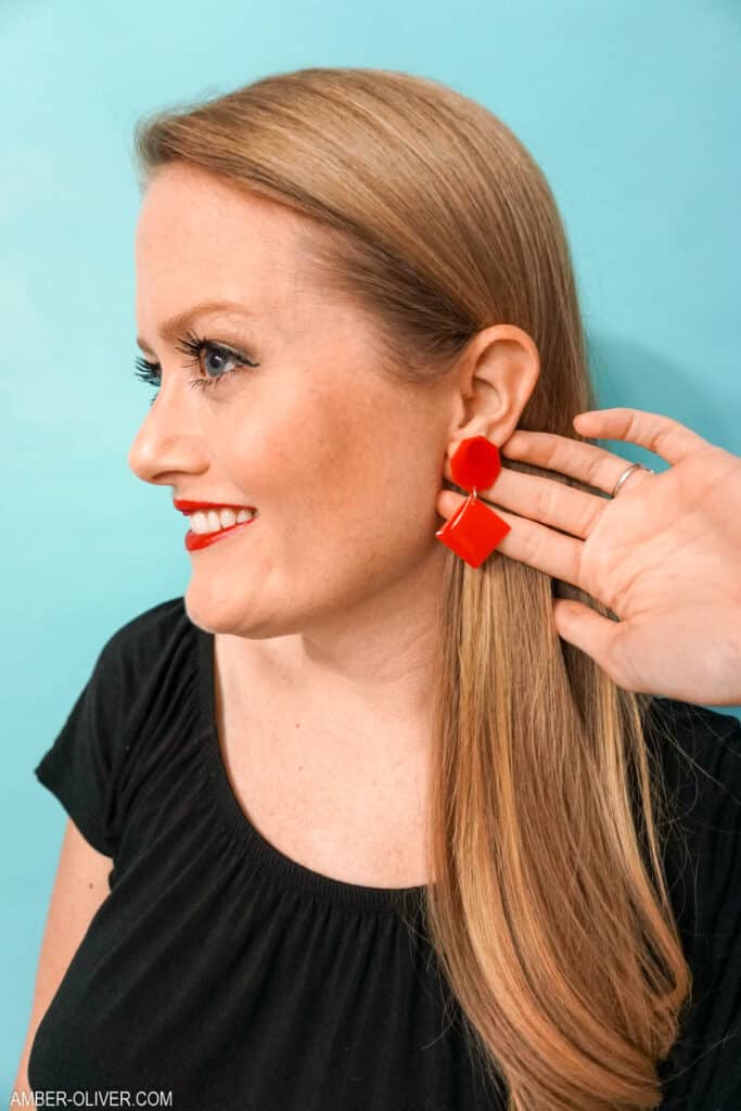 view of red resin statement earrings