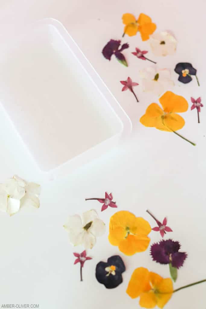 putting dried flowers in resin