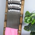 diy blanket ladder leaning on a wall
