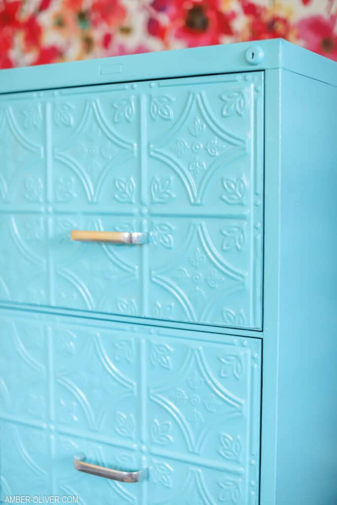 beautiful file cabinet makeover with paint and tin tiles