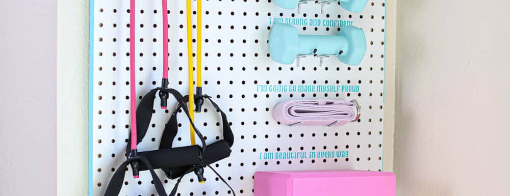 adorable DIY pegboard for home gym small space organizer