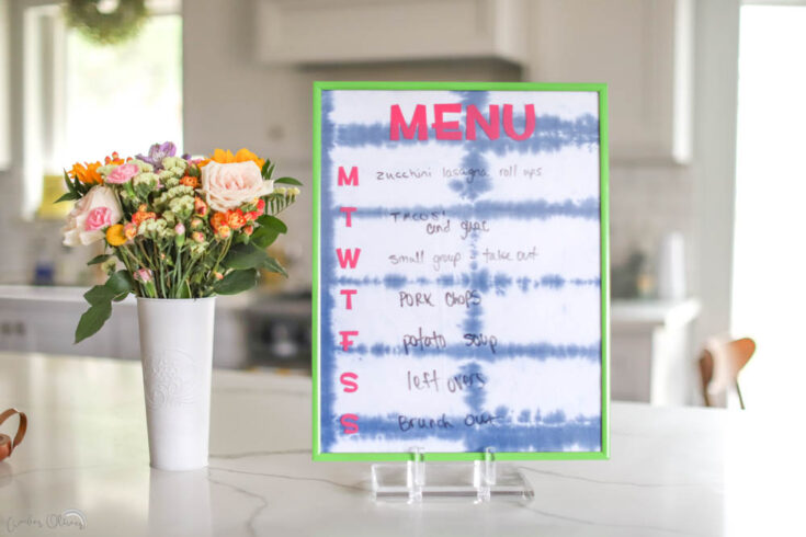 a diy kitchen menu made from thrifted home decor