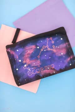 paint a galaxy on a bag with fabric paint and add your astrological sign