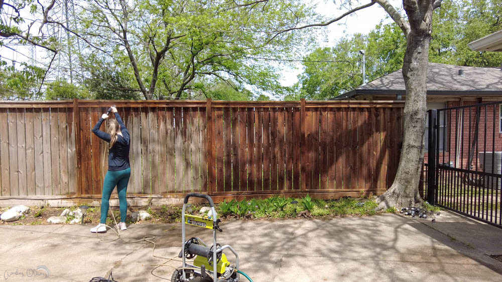 using a pressure washer to clean a diy wood fence before adding stain