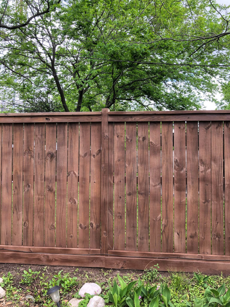 fresh stain on a wood fence