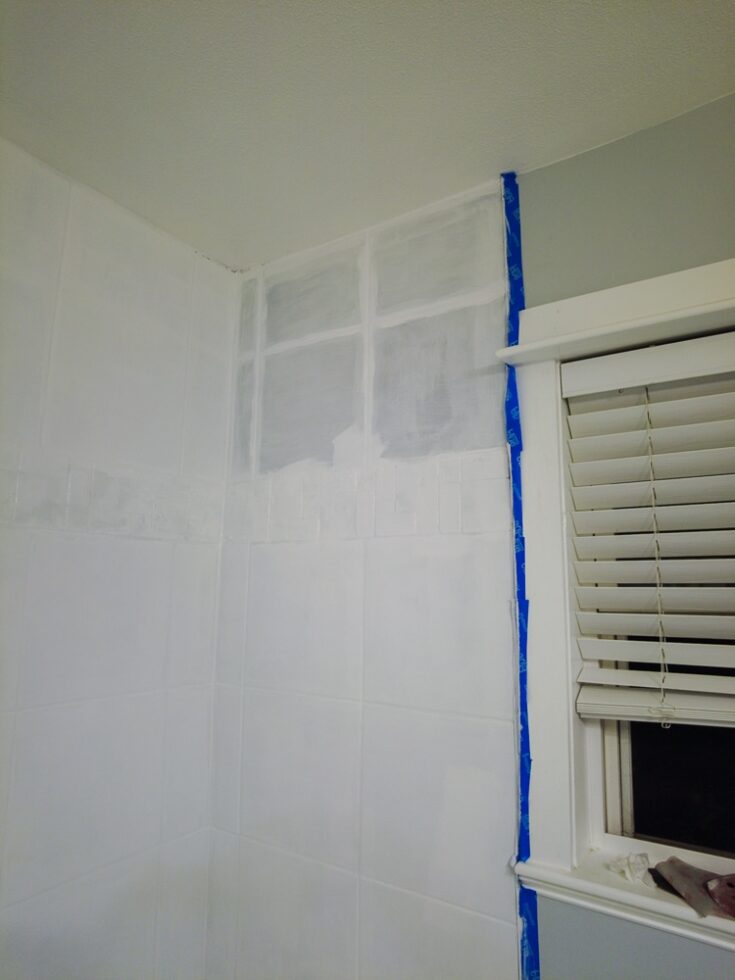 one coat of shower tile paint showing before and after