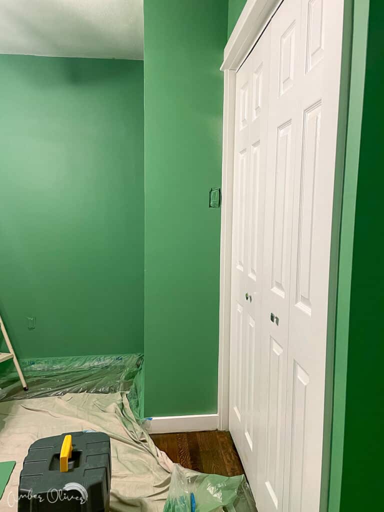 green walls in office painted with a paint sprayer