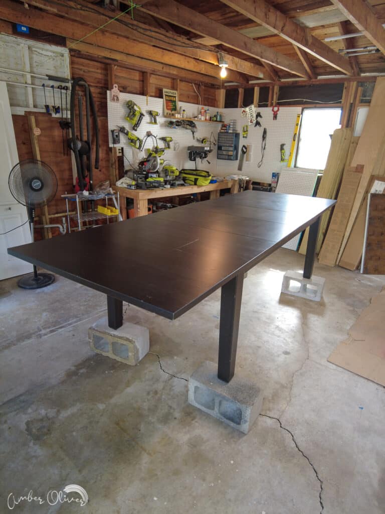 black table before using special primer to paint without sanding