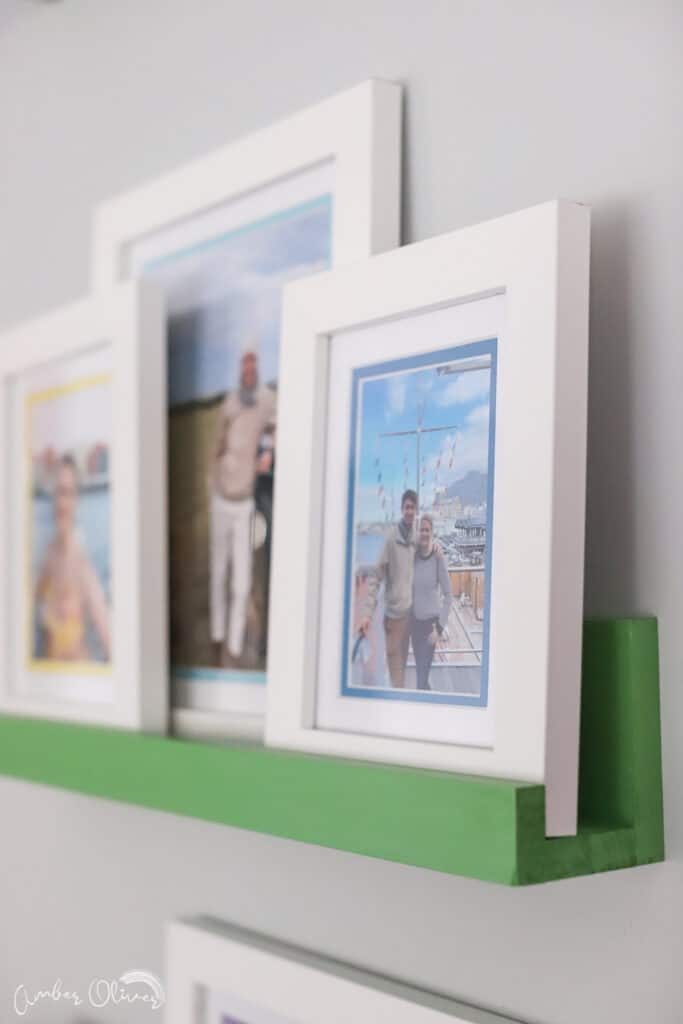 close up view of Art To Frames picture ledge gallery wall