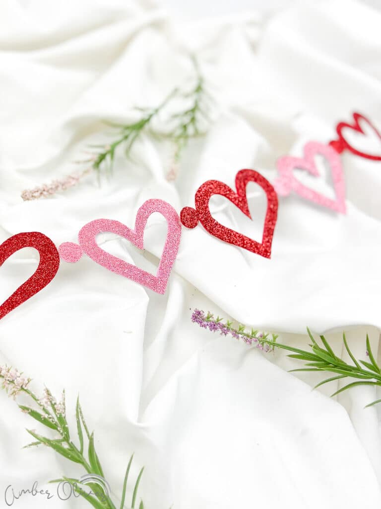 heart valentines garland diy on white background