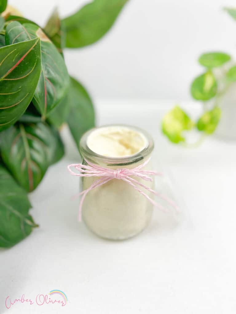 diy whipped lotion in a jar with plants around