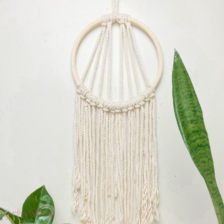 square photo of a diy macrame wall hanging
