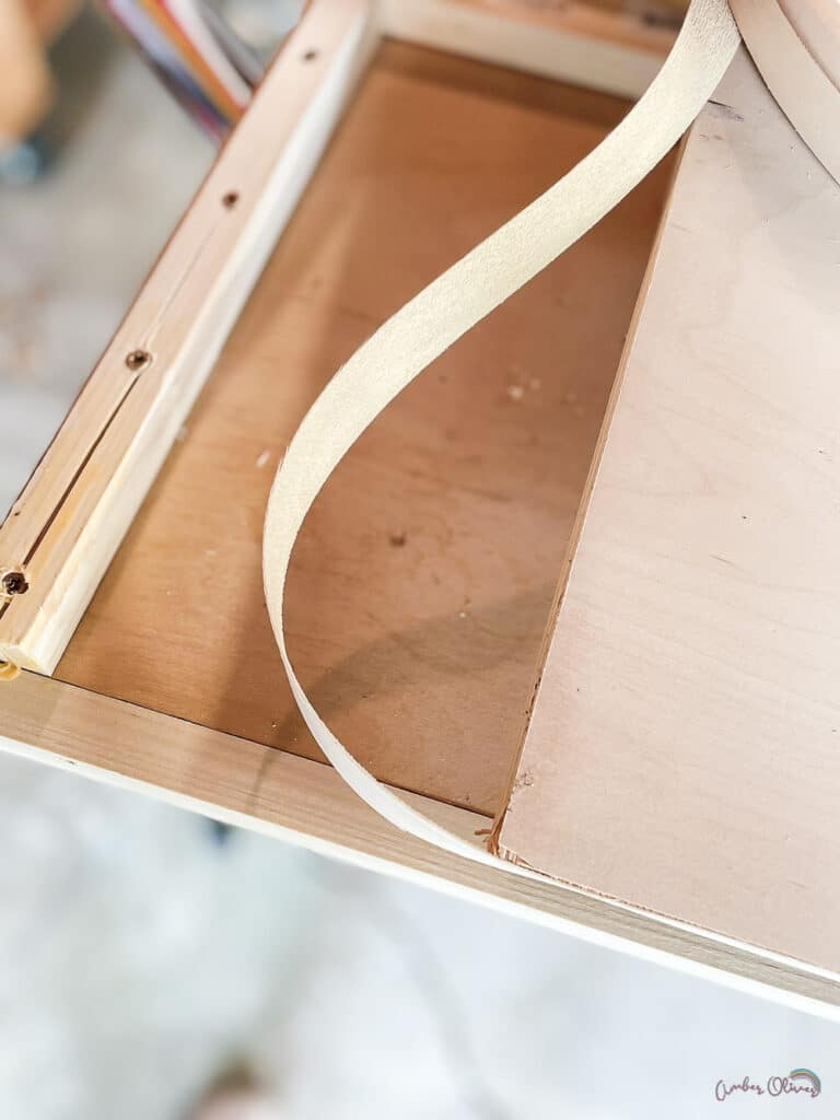 edge banding on a piece of plywood about to be applied