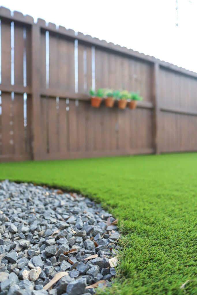 close up of artificial turf and rocks